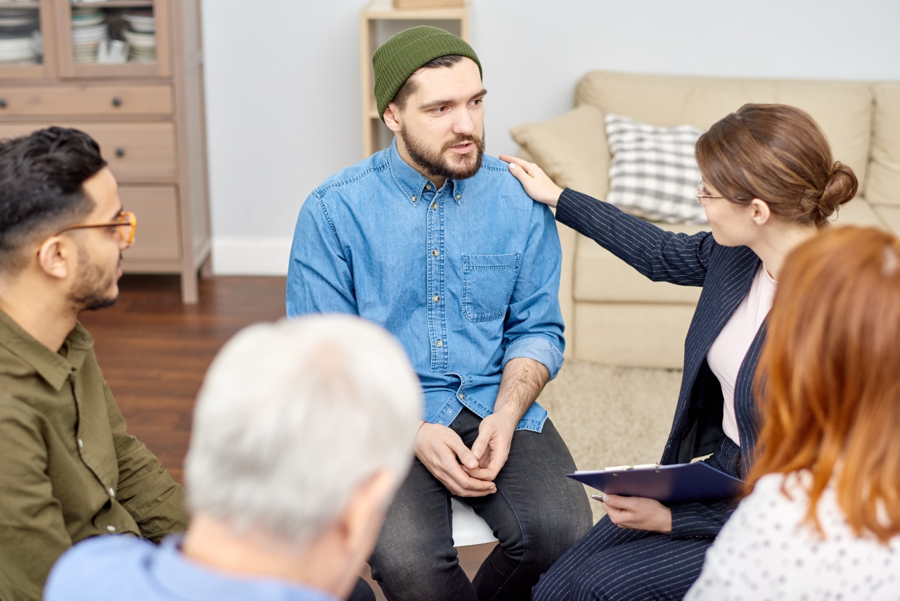 Clients in group therapy during inpatient alcohol rehab